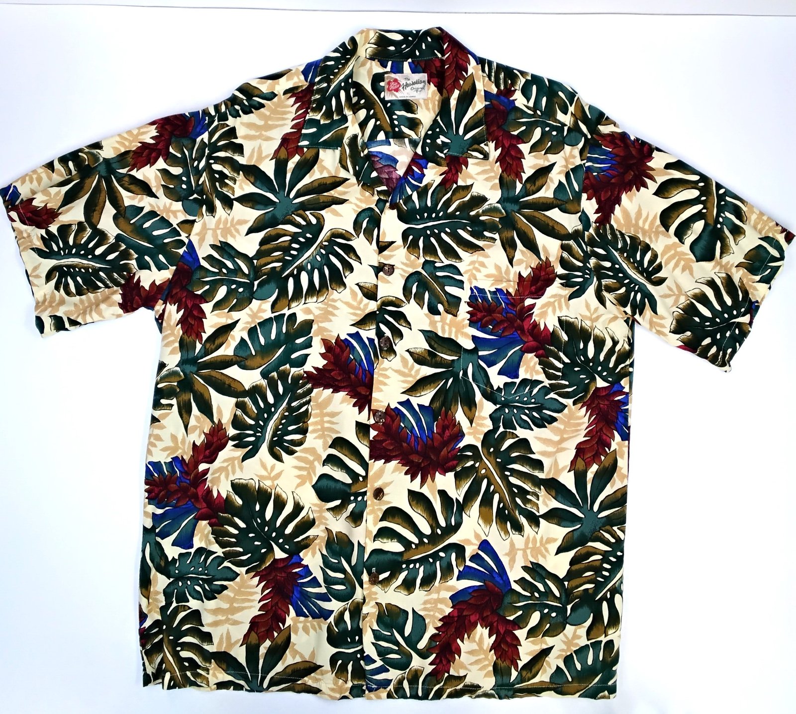 Vintage Hilo Hattie With Philodendron Leaves and Floral Accents